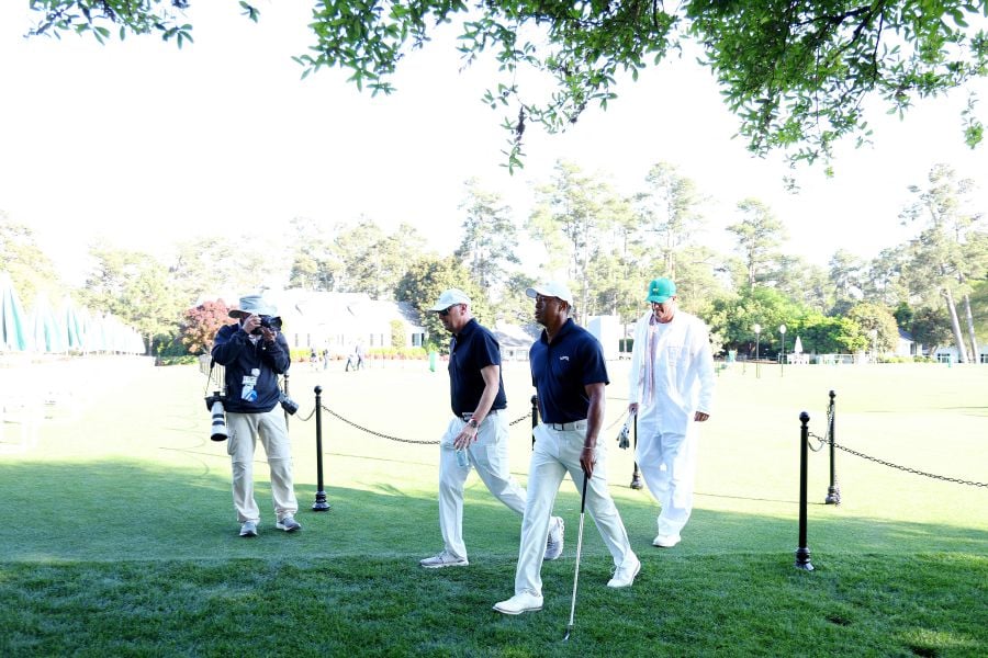 Tiger Woods leaves the course to enter the Clubhouse after practicing a few holes with Rob McNamara and caddie Lance Bennett prior to the 2024 Masters Tournament at Augusta National Golf Club on April 07, 2024 in Augusta, Georgia. - AFP pic