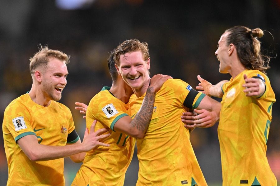 Australia's Kye Rowles (2nd R) celebrates scoring a goal with teammates during the FIFA World Cup 2026 qualifier football match between Australia and Lebanon at CommBank Stadium in Sydney on March 21, 2024. - AFP pic