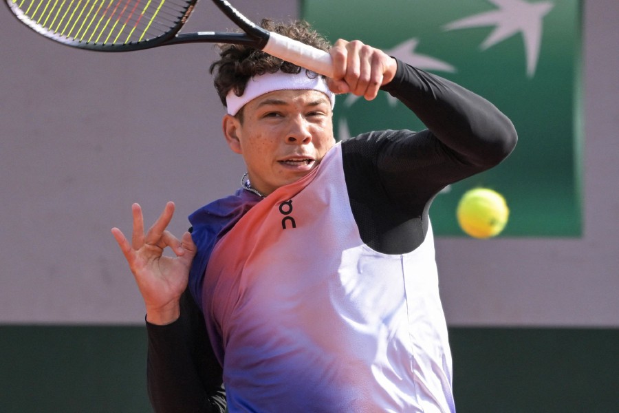 US Ben Shelton plays a forehand return to Japan's Kei Nishikori during their men's singles match on day five of the French Open tennis tournament at the Roland Garros Complex in Paris. - AFP pic