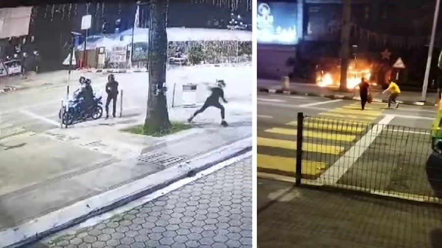 An entertainment outlet on Jalan Yap Kwan Seng caught fire after allegedly being hit with molotov cocktails yesterday (May 9) as a 45-second Closed-Circuit Television (CCTV) recording near the premises went viral on social media. —Screengrab from Viral Video