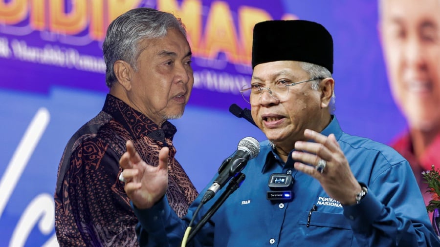 Datuk Seri Dr Ahmad Zahid Hamidi (left) says that Tan Sri Annuar Musa is suffering from political separation sickness.