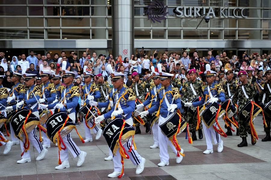 The KRI Bima Suci 945’s cadet marching band in full flight at Suria KLCC in Kuala Lumpur. Image: Bernama