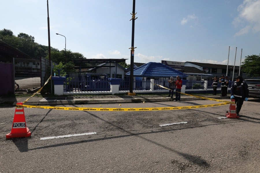In the 2.45 am attack at Ulu Tiram police station on Friday, three were killed, namely two policemen, Constable Ahmad Azza Fahmi Azhar, 22, Constable Muhamad Syafiq Ahmad Said, 24, and the 21-year-old suspect. - BERNAMA pic