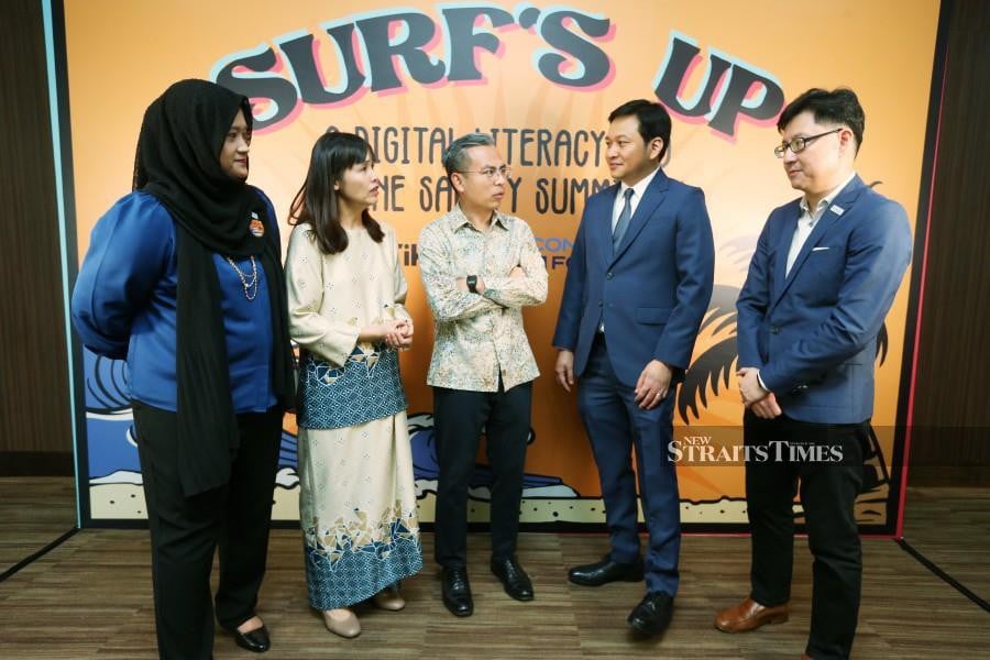 Communications and Digital Minister Fahmi Fadzil and his deputy Teo Nie Ching attend the Surfs Up digital literacy summit. -Photo by NSTP/ROHANIS SHUKRI