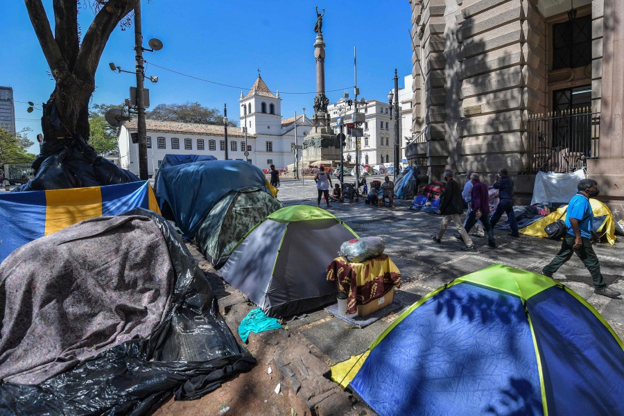 View of tents of homeless people at Patio do Colegio, in Sao Paulo downtown, Brazil. - Sao Paulo is facing a homelessness crisis, as recent prices become too heavy of a burden for an increasingly impoverished population. (Photo by NELSON ALMEIDA / AFP)