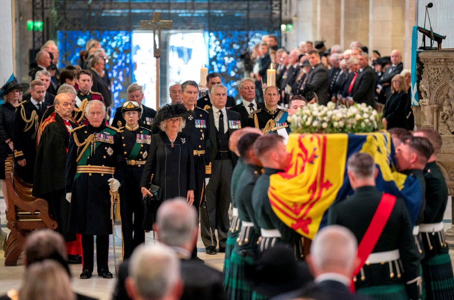Britain's King Charles, Queen Camilla, Anne, Princess Royal, Prince Andrew, Duke of York, Prince Edward, Earl of Wessex, and Vice Admiral Sir Tim Laurence attend a Service of Prayer and Reflection for the Life of Queen Elizabeth II at St Giles' Cathedral, Edinburgh, Scotland, Britain September 12, 2022. - REUTERS pic