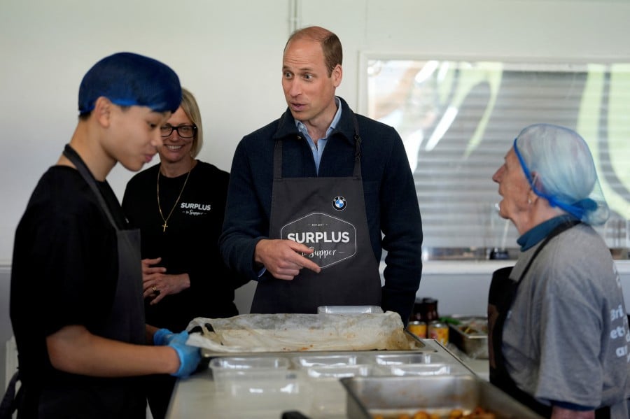 Britain's Prince William meets workers during a visit to Surplus to Supper, a surplus food redistribution charity, in Sunbury-on-Thames, Surrey, Britain, April 18, 2024. REUTERS PIC