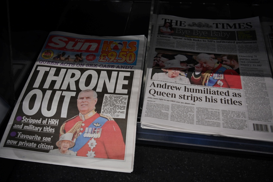 Newspapers display frontpage headlines and stories of Britain's Prince Andrew after his titles were removed by his mother, Queen Elizabeth II, in London, Britain. - EPA Pic