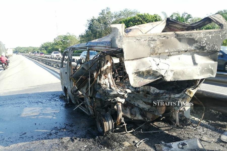 One person was burnt to death while two others suffered serious injuries in an accident involving two vehicles at KM198.4 of the North-South Expressway here. - Pic courtesy of Fire and Rescue Dept