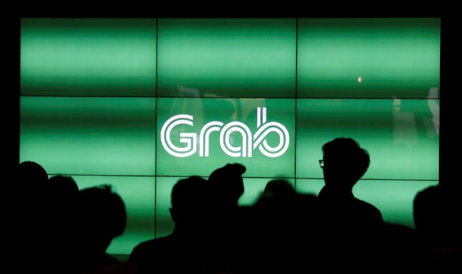 Grab Holdings raised its full-year profit forecast on Wednesday after reporting a higher-than-expected quarterly revenue, driven by recent cost-reduction measures and robust demand for its ride-share services.
