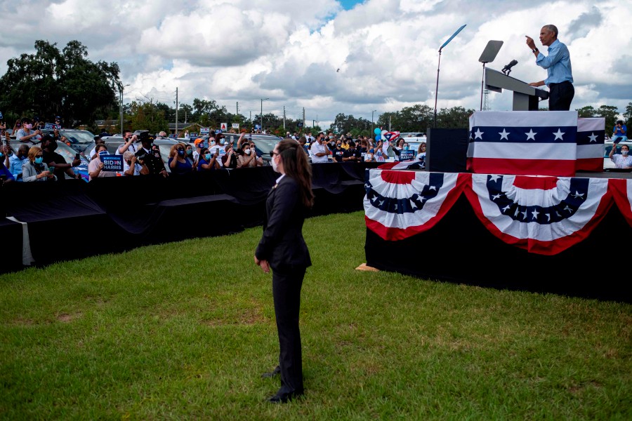 Former US President Barack Obama speaks at a Biden-Harris drive-in rally in Orlando, Florida. - AFP pic