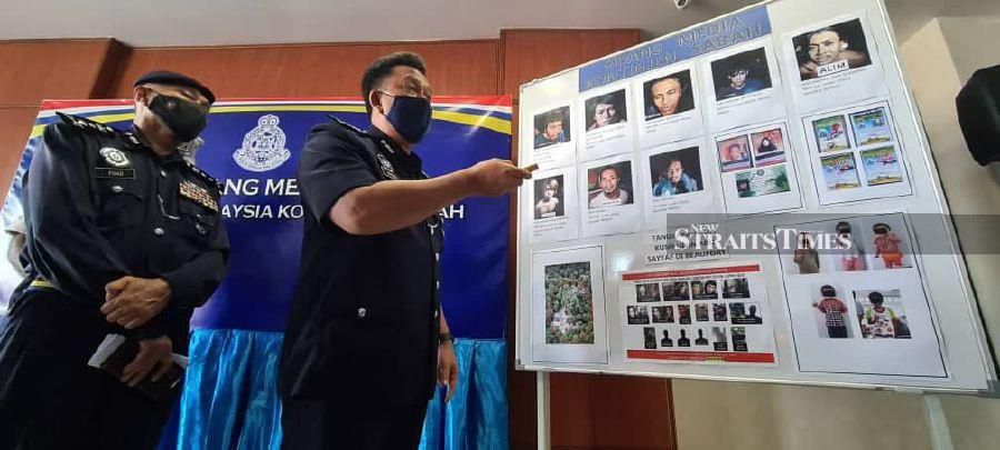 A pre-dawn raid in Beaufort on Saturday led to the capture of eight members of the notorious Abu Sayyaf terror organisation. - STR/ JUWAN RIDUAN