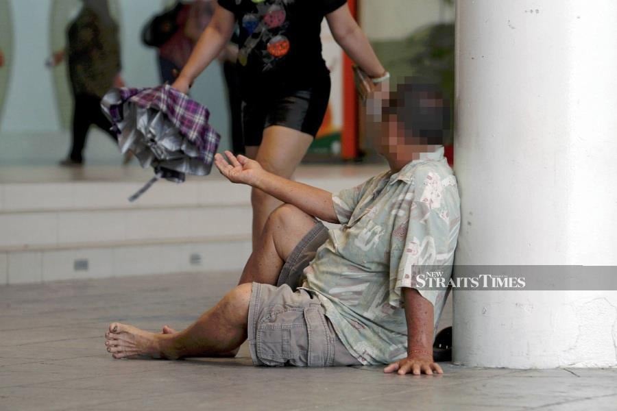 There are many beggars and homeless people who roam the streets. - NSTP file pic