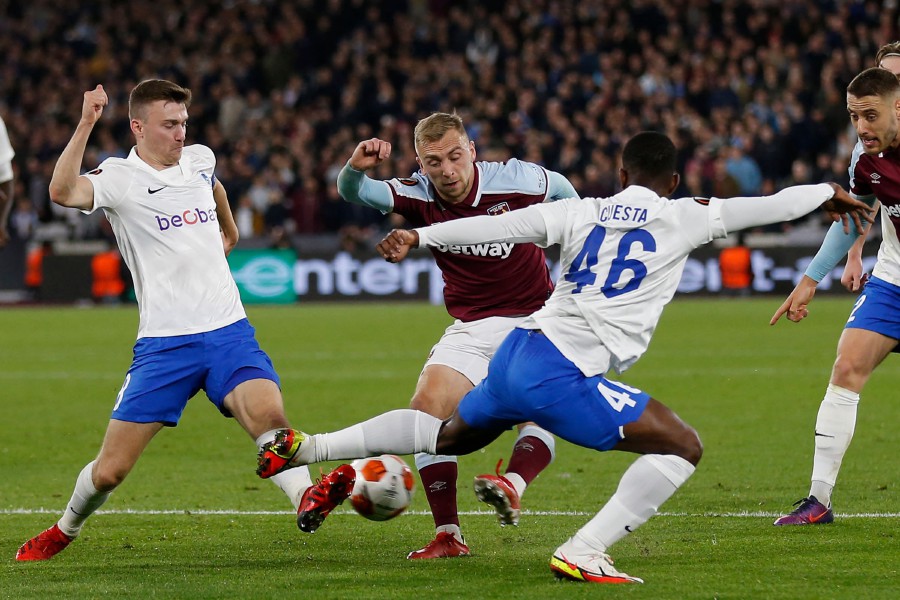 West Ham United's English striker Jarrod Bowen (C) has this shot blocked during the UEFA Europa League group H football match between West Ham United and Genk at The London Stadium, in east London. - AFP PIC