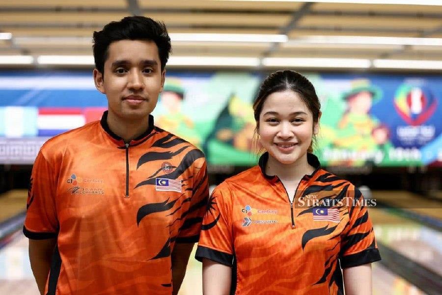 Megat Zaqrul and Nur Hazirah at the Youth World Cup in Lima, Peru.