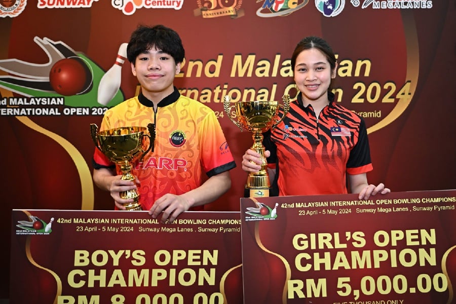 Ethan Damien Goh and Nur Hazirah Ramli won the boys’ and girls’ Open respectively at the Malaysia Open on Sunday. - Pic courtey from Bowling Malaysia FB