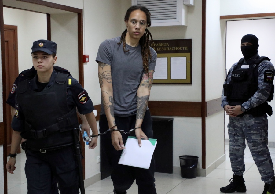 Two-time Olympic gold medalist and WNBA player Brittney Griner (C) is escorted to hear the court's verdict in Khimki City court in Khimki outside Moscow, Russia. The Khimki City Court has sentenced Griner to nine years in prison after finding her guilty on charges of drug smuggling. - EPA pic