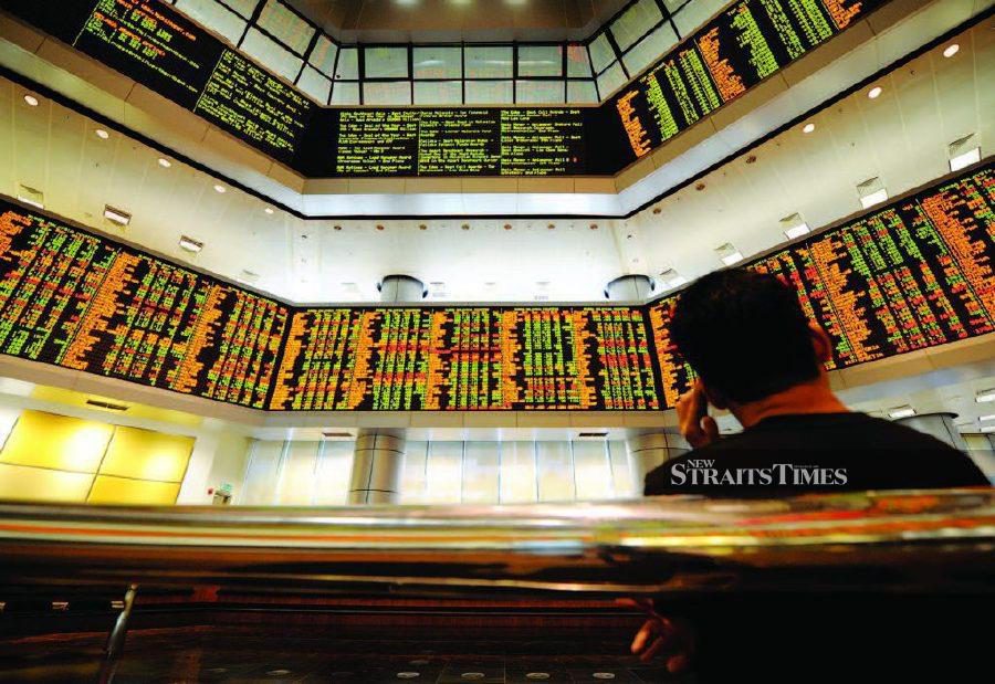 Bursa Malaysia turned lower at the midday break amid a regional downtrend.