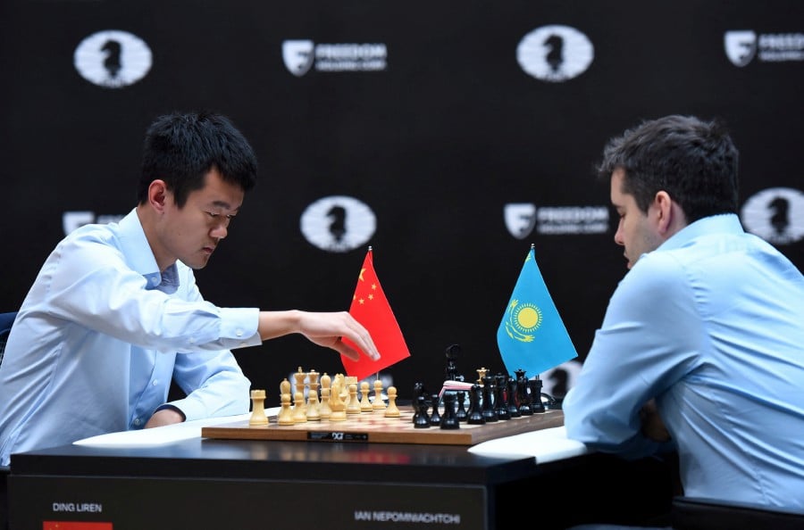 Ding Liren beats Ian Nepomniachtchi to become first world champion