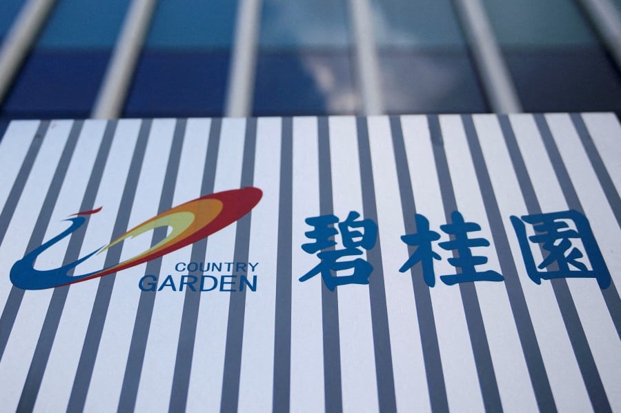 The company logo of Chinese developer Country Garden is pictured at the Shanghai Country Garden Center in Shanghai, China August 9, 2023. REUTERS/Aly Song/File Photo