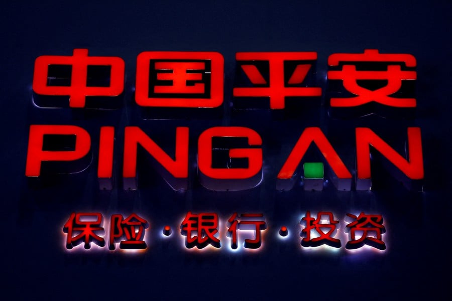FILE PHOTO: The logo of Ping An Insurance seen at a Beijing event in April, 2018. REUTERS/Damir Sagolj/File Photo