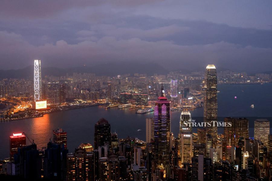 An evening view of the financial Central district and Victoria Harbour in China. REUTERS/Tyrone Siu/File Photo