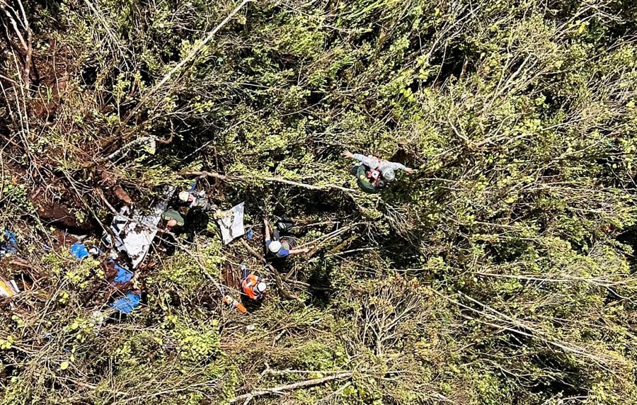 Eight passengers, including three minors, and two crew members died in a small plane crash in northwestern Colombia. (Photo by Handout / Colombian Air Force / AFP) /  