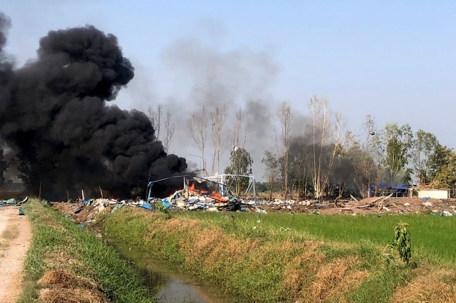 Smoke rising after an explosion at a fireworks factory near Sala Khao township in Thailand's Suphan Buri province. - AFP pic