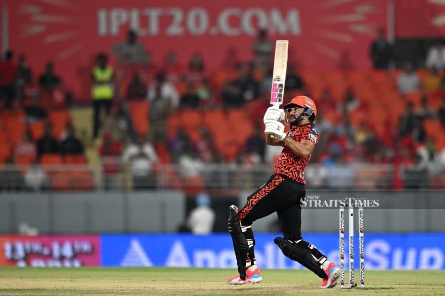 Sunrisers Hyderabad's Nitish Kumar Reddy watches the ball after playing a shot during the Indian Premier League (IPL) Twenty20 cricket match against Punjab Kings at the Maharaja Yadavindra Singh International Cricket Stadium in Mohali on Tuesday. AFP PIC