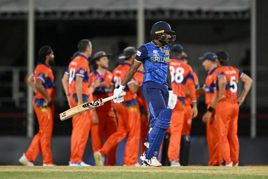 Sri Lanka's Kamindu Mendis is bowled out during the ICC men's Twenty20 World Cup 2024 group D cricket match between Sri Lanka and the Netherlands at Daren Sammy Cricket Ground in Gros Islet, St. Lucia. (Photo by TIMOTHY A. CLARY / AFP)