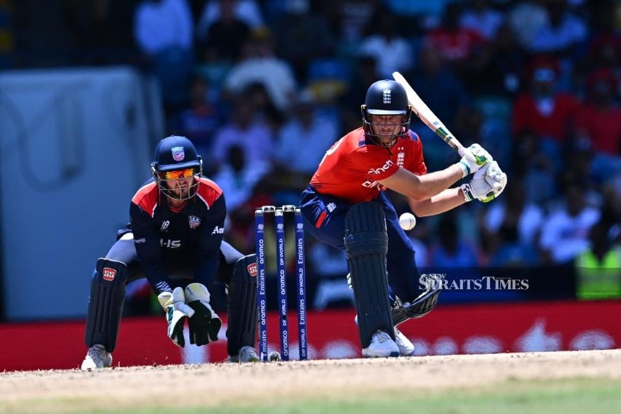 England captain and wicketkeeper Jos Buttler hits a four during Sunday’s T20 World Cup Super Eight match against the United States at Kensington Oval in Bridgetown, Barbados on June 23, 2024. AFP PIC 