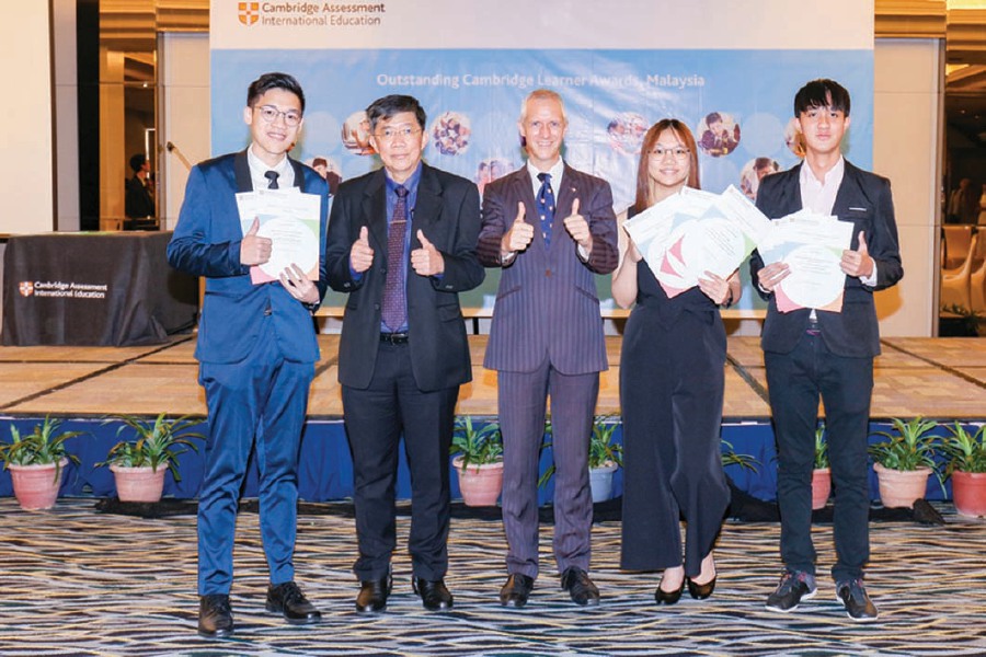 (From left) Lee Kin Kuan, Ng Kim Huat, Dr Ben Schmidt, Kimberley Tan Hui Ru and Tan Guan Yu.