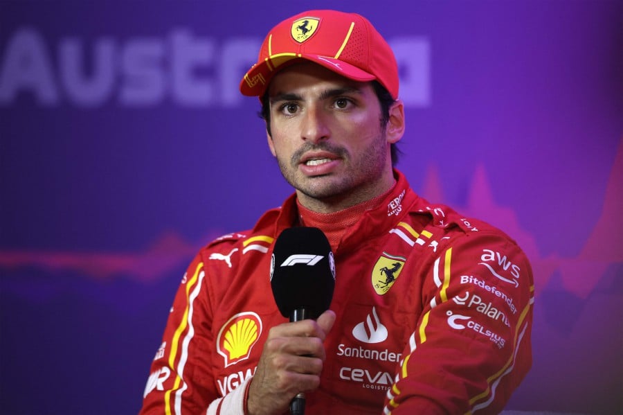 Ferrari's Spanish driver Carlos Sainz speaks at a press conference after the qualifying session of the Formula One Australian Grand Prix at the Albert Park Circuit in Melbourne. - AFP PIC