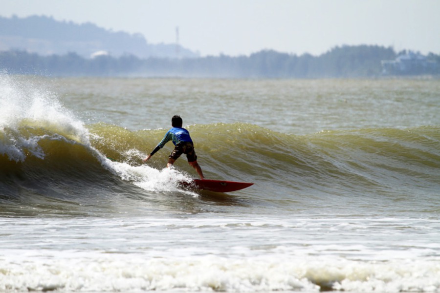 Visiting Cherating Beach between Apr and Oct offers the best conditions for water sports like surfing and windsurfing. - File pic credit (Hagen Allan)