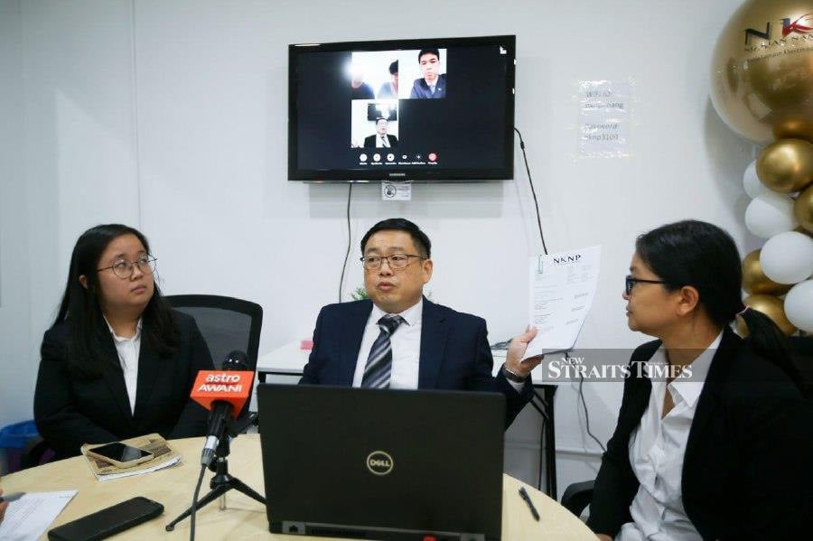 The family of two Chinese tourists, who died when an uprooted tree crashed on their car last September, has sent a letter of demand to five parties, seeking an apology and RM1.7 million in compensation through their lawyer, Ng Kian Nam. - NSTP/ MIKAIL ONG