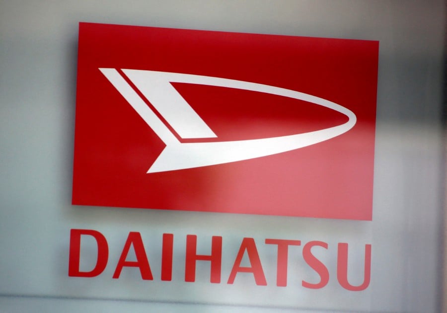 FILE PHOTO: Daihatsu Motors logo is seen at its showroom in Tokyo, Japan June 12, 2017. Picture taken on June 12, 2017. REUTERS/Kim Kyung-Hoon/File Photo