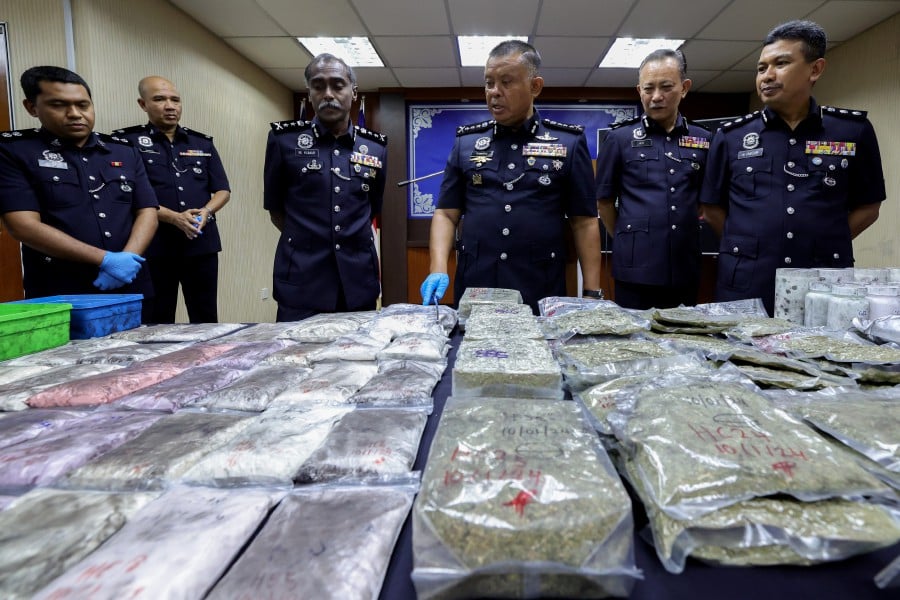 Johor police chief Datuk Kamarul Zaman Mamat said the 61-year-old woman and her 40-year-old son, as well as a 59-year-old male friend, were arrested by the Johor Narcotics Criminal Investigation Department (NCID) in the special operations. BERNAMA PIC