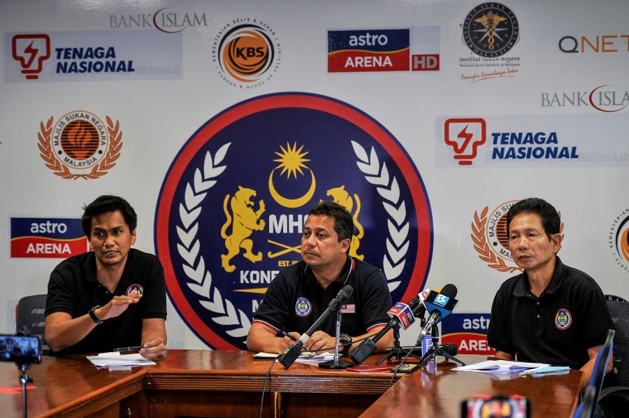 Datuk Ahmad Najmi Abdul Razak (centre) has been appointed as the new national team manager. Bernama Pic