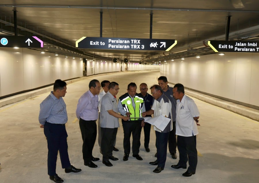 The opening of the five-kilometre Tun Razak Exchange (TRX) underground tunnel on Nov 29 is expected to reduce traffic into the city by 30 per cent, said Works Minister Datuk Seri Alexander Nanta Linggi. BERNAMA PIC
