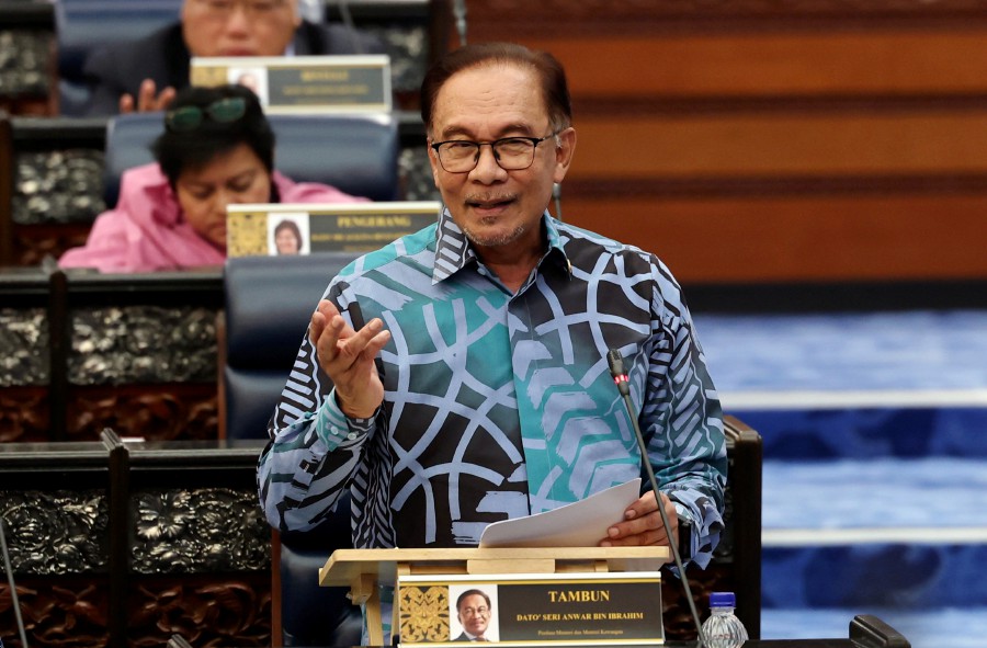Prime Minister Datuk Seri Anwar Ibrahim today reiterated that opposition members of parliament (MPs) must go through the proper process to receive equal allocations as given to government MPs. - Bernama pic