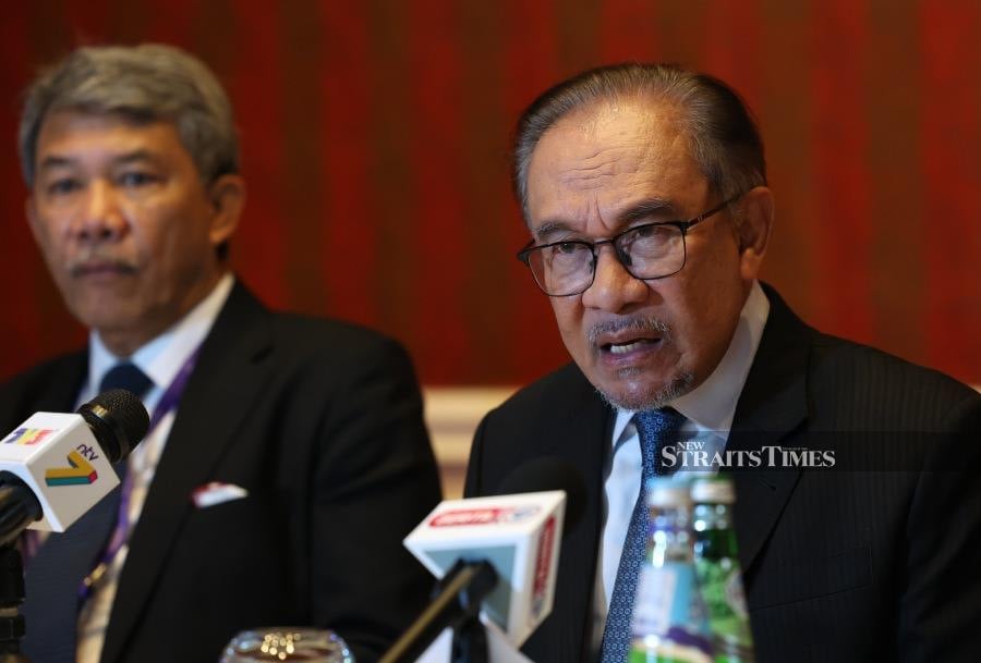  Prime Minister Datuk Seri Anwar Ibrahim during a press conference after a three-day official visit to Qatar.