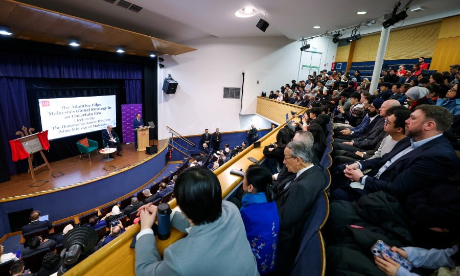 Prime Minister Datuk Seri Anwar Ibrahim delivering his lecture at the London School of Economics and Political Science. BERNAMA pic