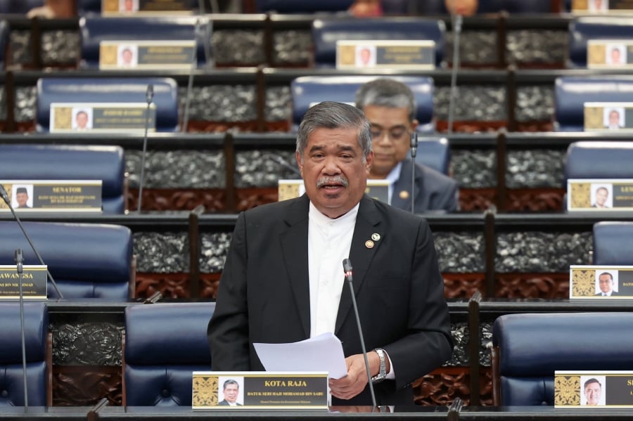Agriculture and Food Security Minister Datuk Seri Mohamad Sabu said the programme, which was introduced in February 2021, has set a target of producing an average of seven metric tonnes of padi per hectare, involving 150,000ha of land. - BERNAMA pic