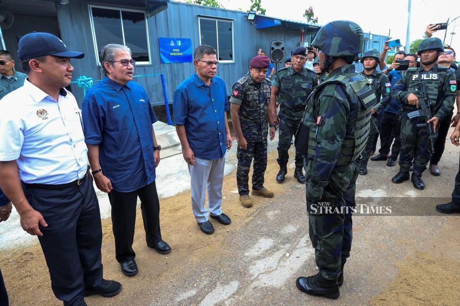 At least 10 of the country's 141 entry points will be involved in the pilot project for the single border agency (SBA), said Home Minister Datuk Seri Saifuddin Nasution Ismail. NSTP/NIK ABDULLAH NIK OMAR