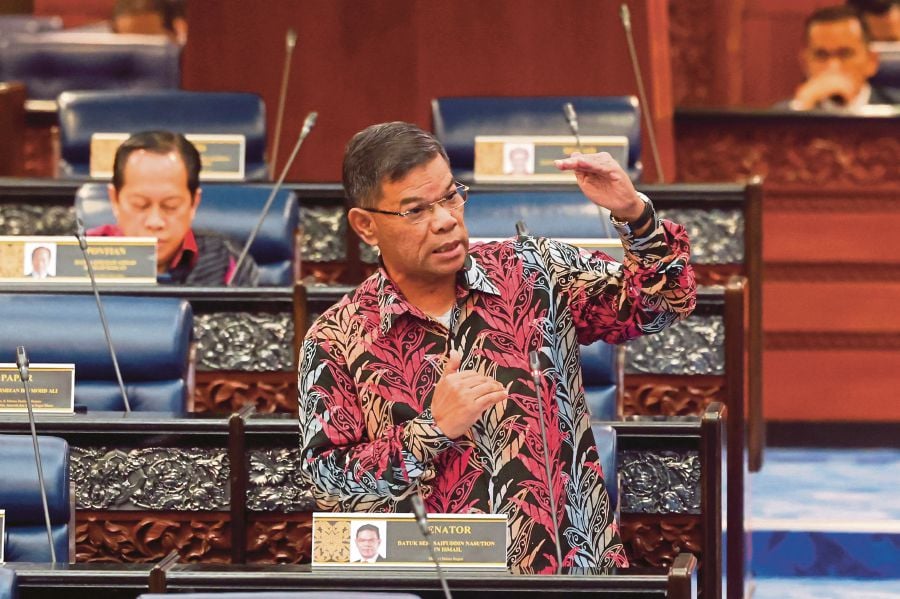 Home Minister Datuk Seri Saifuddin Nasution Ismail today revealed in the Dewan Rakyat that not all of those who became victims of job scams abroad were duped by the tactics employed by the syndicates. - BERNAMA pic