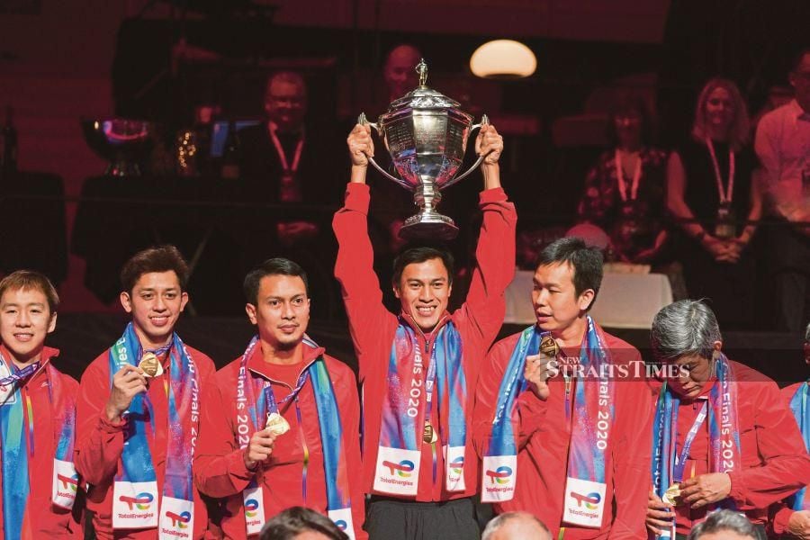 Indonesia players celebrate with the Thomas Cup trophy in Aarhus, Denmark, on Sunday. EPA PIC