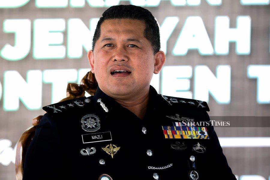 Terengganu police chief Datuk Mazli Mazlan said the two policemen were arested following a report lodged by a man at the Gong Badak police station on Saturday.