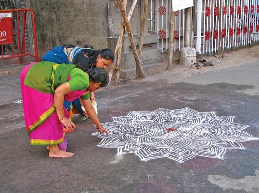 Crafting the South Indian-style Kolam. 
