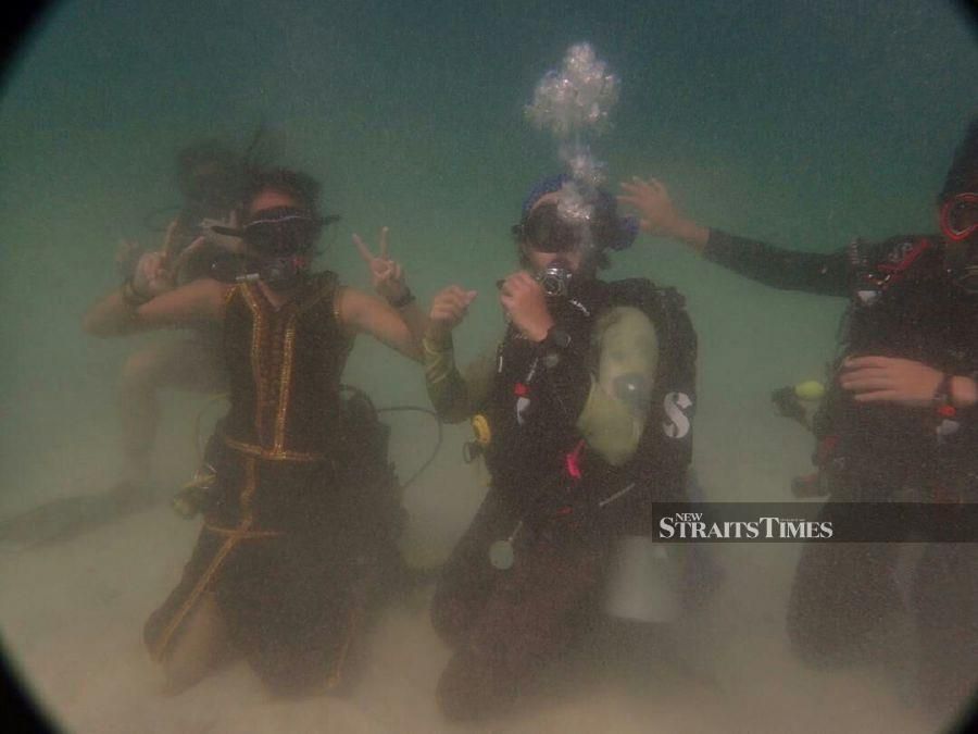 Sabah Dive Operator Makes Splash With Kaamatan Theme | New Straits ...