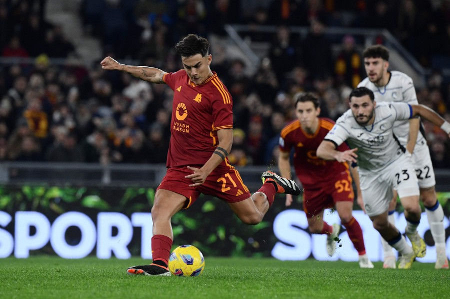 Roma's Paulo Dybala kicks a penalty to score the first goal against Atalanta at the Olympic Stadium, in Rome. - AFP PIC